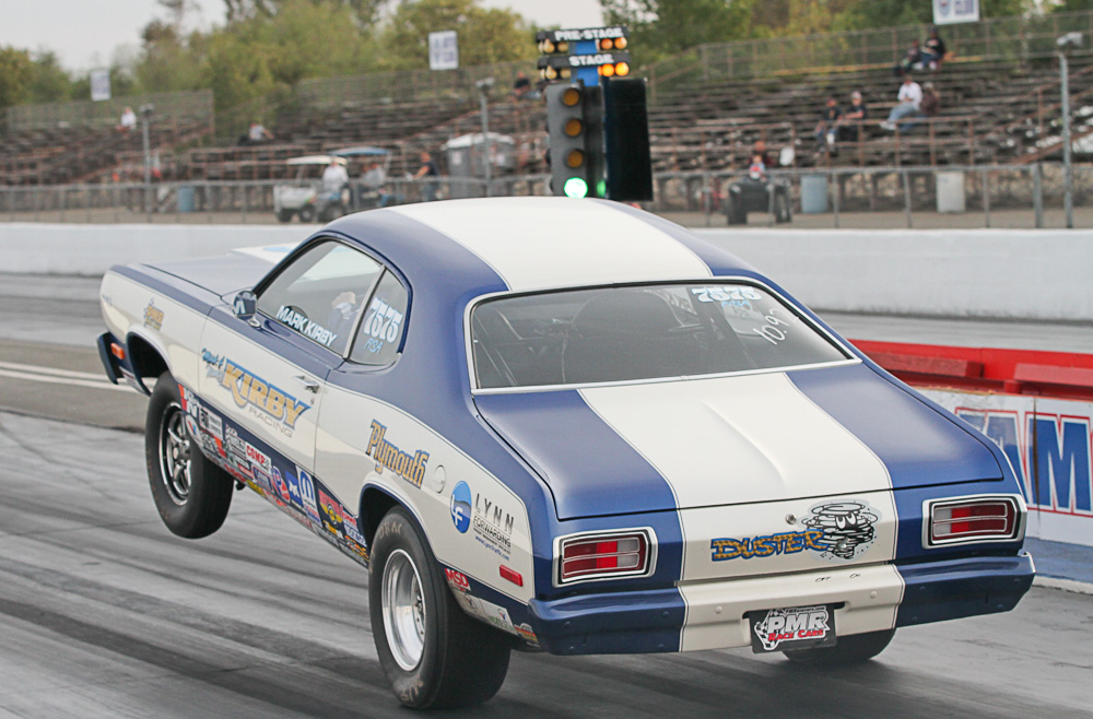 Mark Kirby shifts the weight to the rear tires of his Plymouth Duster