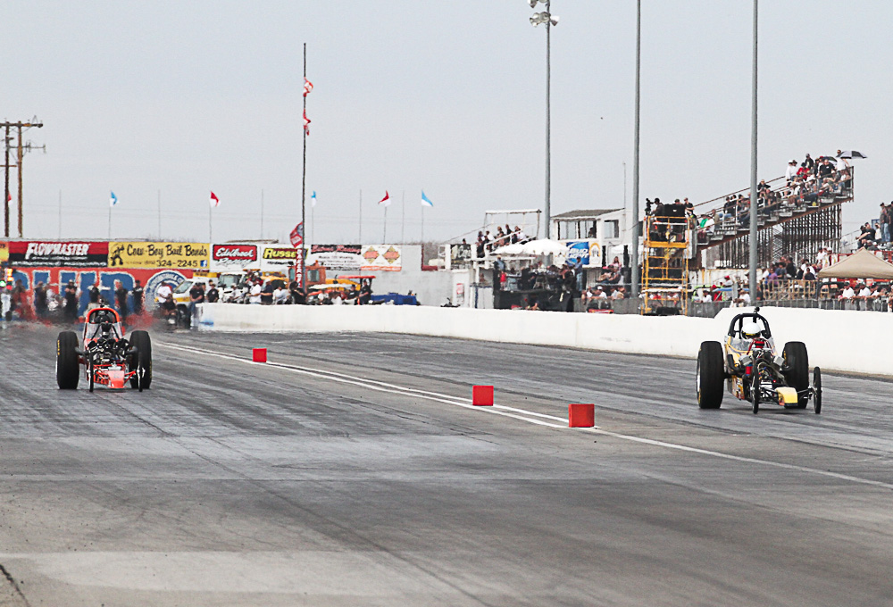 Wayne Ramay - Jr. Fuel Winner (on the left)  Don Enriquez (on the right) gets to the finish line first but redlighted at the start line 